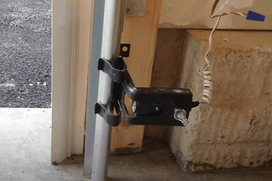 How does a garage door safety sensors work?